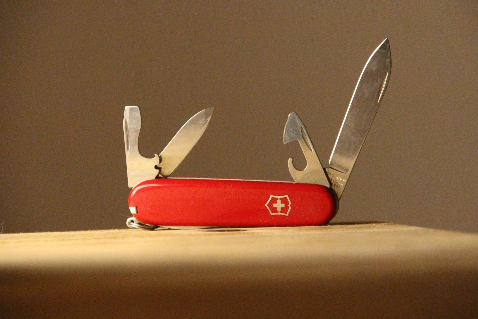 red and silver multi-purpose kitchen tool